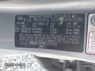 2006 Kia Sportage LX with VIN KNDJE723X67242610, listed as a IAAI auction lot 41735144 with 244,979 mi miles and . Bid and sale history available at DreamBid. Image 9.