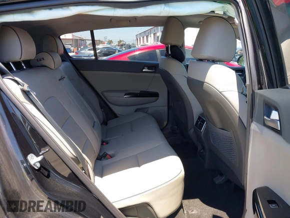 2019 Kia Sportage EX with VIN KNDPN3AC2K7602435, listed as a IAAI auction lot 42233427 with 58,730 mi miles and . Bid and sale history available at DreamBid. Image 8.