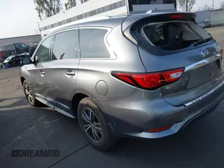 2016 Infiniti QX60 with VIN 5N1AL0MM4GC505861, listed as a IAAI auction lot 41366198 with 168,199 mi miles and . Bid and sale history available at DreamBid. Image 3.