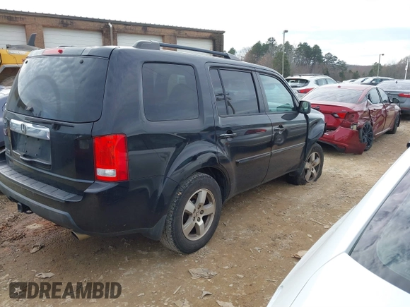 2011 Honda Pilot EX-L with VIN 5FNYF3H69BB043509, listed as a IAAI auction lot 41127719 with 241,167 mi miles and . Bid and sale history available at DreamBid. Image 4.