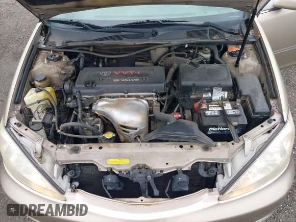 2002 Toyota Camry LE z VIN 4T1BE32K52U086150, wystawiony jako IAAI lot #42126685 z przebiegiem 175 212 mil mil oraz . Historia ofert i sprzedaży dostępna na DreamBid. Obrazek 10.