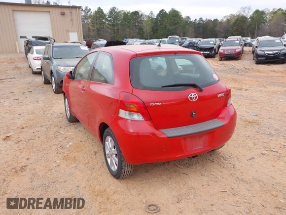 2009 Toyota Yaris with VIN JTDJT903595243068, listed as a IAAI auction lot 41899358 with 310,199 mi miles. Bid and sale history available at carsss.com. Image 3.
