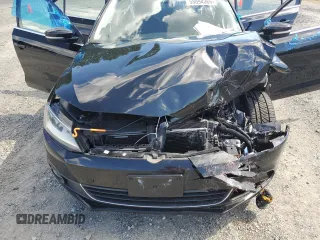 2014 Volkswagen Jetta SEL z VIN 3VWL17AJ2EM390112, wystawiony jako Copart lot #58094365 z przebiegiem Nie podano mil oraz Czysty tytuł • Clean title. Historia ofert i sprzedaży dostępna na DreamBid. Obrazek 11.