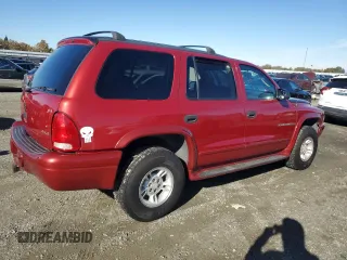 2001 Dodge Durango z VIN 1B4HS28Z61F579891, wystawiony jako Copart lot #80510284 z przebiegiem 186 180 mil mil oraz Czysty tytuł • Clean title. Historia ofert i sprzedaży dostępna na DreamBid. Obrazek 3.