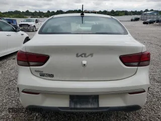 2022 Kia Rio LX with VIN 3KPA24AD7NE486506, listed as a Copart auction lot 64212244 with 52,852 mi miles and Salvage Title. Bid and sale history available at carsss.com. Image 6.