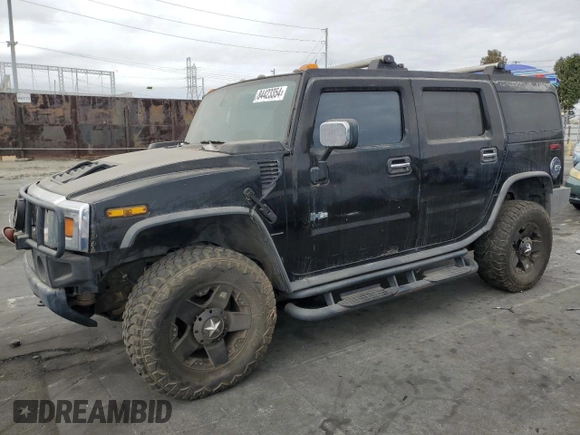 2003 Hummer H2 with VIN 5GRGN23UX3H101416, listed as a Copart auction lot 84423354 with 113,699 mi miles and Clean Title. Bid and sale history available at carsss.com. Image 1.