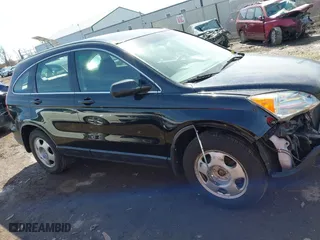 2007 Honda CR-V LX with VIN JHLRE48307C072357, listed as a IAAI auction lot 41850670 with 199,479 mi miles. Bid and sale history available at carsss.com. Image 14.