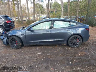 2022 Tesla Model 3 Performance with VIN 5YJ3E1EC5NF270082, listed as a IAAI auction lot 40930688 with 1 mi miles. Bid and sale history available at carsss.com. Image 13.