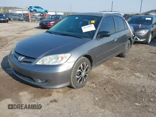 2004 Honda Civic LX with VIN 2HGES16504H634808, listed as a IAAI auction lot 41974085 with 201,392 mi miles. Bid and sale history available at carsss.com. Image 2.