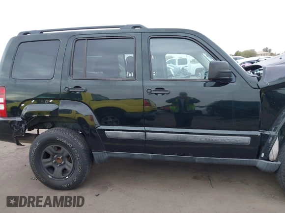 2012 Jeep Liberty Sport with VIN 1C4PJMAK5CW145393, listed as a IAAI auction lot 41558487 with 133,212 mi miles. Bid and sale history available at carsss.com. Image 13.