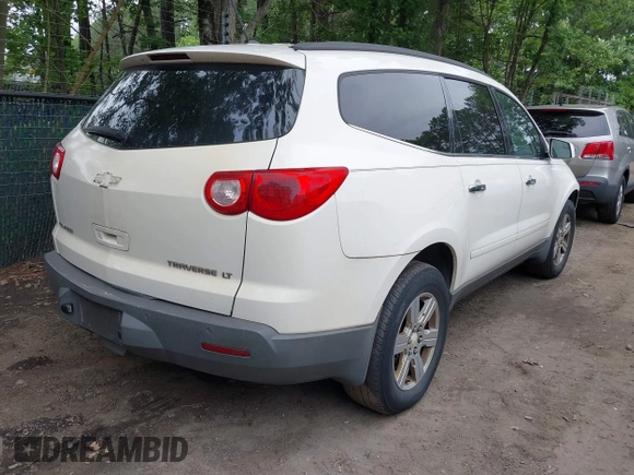 2011 Chevrolet Traverse 1LT z VIN 1GNKRGED3BJ128529, wystawiony jako IAAI lot #42355440 z przebiegiem 166 008 mil mil oraz . Historia ofert i sprzedaży dostępna na DreamBid. Obrazek 4.