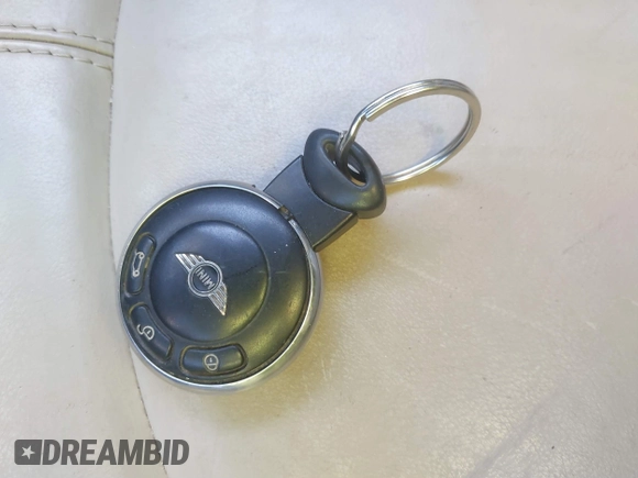 2012 MINI Countryman S with VIN WMWZC5C52CWL62574, listed as a IAAI auction lot 41768196 with 159,816 mi miles and . Bid and sale history available at DreamBid. Image 11.