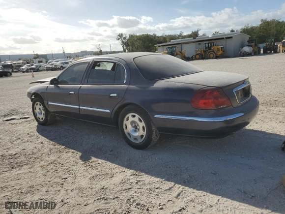 2001 Lincoln Continental with VIN 1LNHM97V21Y680964, listed as a Copart auction lot 80640714 with 0 mi miles and Salvage Title. Bid and sale history available at carsss.com. Image 2.