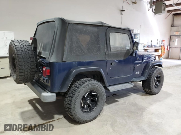 2002 Jeep Wrangler Sport with VIN 1J4FA49S82P703420, listed as a Copart auction lot 53322175 with 87,642 mi miles and Salvage Title. Bid and sale history available at carsss.com. Image 3.