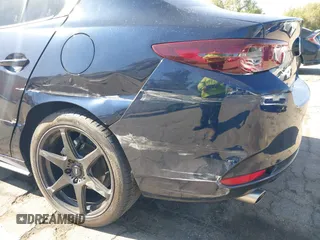 2021 Mazda 3 S with VIN JM1BPAALXM1326956, listed as a IAAI auction lot 42304248 with 55,104 mi miles and . Bid and sale history available at DreamBid. Image 22.