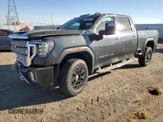 2023 GMC Sierra 3500HD Denali z VIN 1GT49WEY0PF190849, wystawiony jako Copart lot #74135014 z przebiegiem 23 377 mil mil oraz Szkody całkowita. Historia ofert i sprzedaży dostępna na DreamBid. Obrazek 1.