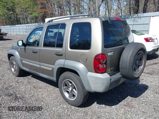 2005 Jeep Liberty Sport with VIN 1J4GL48K35W568972, listed as a IAAI auction lot 41980884 with 198,430 mi miles and . Bid and sale history available at DreamBid. Image 3.