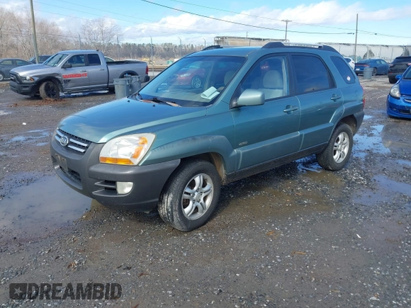 2005 Kia Sportage LX with VIN KNDJE723357058608, listed as a IAAI auction lot 41564533 with 262,794 mi miles and . Bid and sale history available at carsss.com. Image 2.