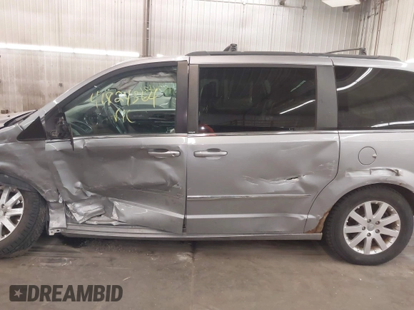 2013 Chrysler Town & Country Touring with VIN 2C4RC1BG9DR714736, listed as a IAAI auction lot 41824364 with 156,486 mi miles. Bid and sale history available at carsss.com. Image 15.