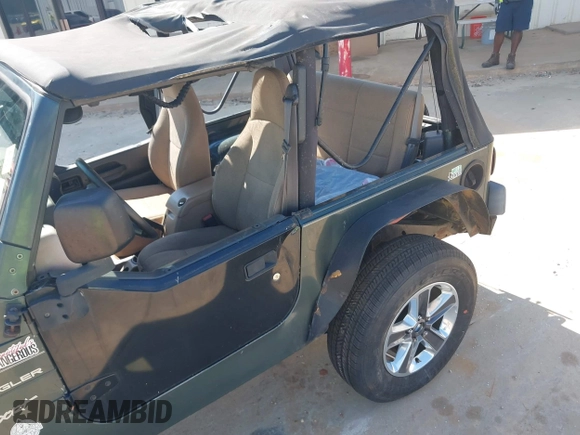 2002 Jeep Wrangler Sport with VIN 1J4FA49S52P760173, listed as a IAAI auction lot 42468550 with 201,682 mi miles and . Bid and sale history available at DreamBid. Image 6.