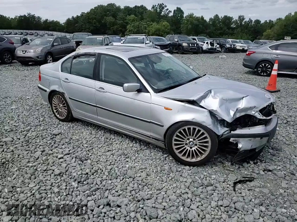 2003 BMW 3 Series 330i with VIN WBAEV53423KM30265, listed as a Copart auction lot 70214374 with 152,171 mi miles and Salvage Title. Bid and sale history available at carsss.com. Image 11.
