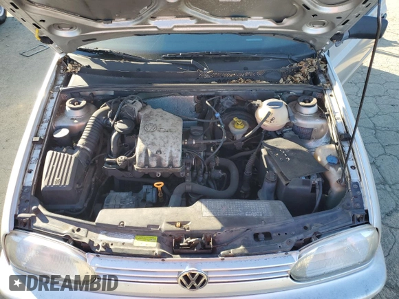 1998 Volkswagen Golf z VIN 3VWFA81H8WM251233, wystawiony jako Copart lot #42441795 z przebiegiem 122 969 mil mil oraz Czysty tytuł • Clean title. Historia ofert i sprzedaży dostępna na DreamBid. Obrazek 11.