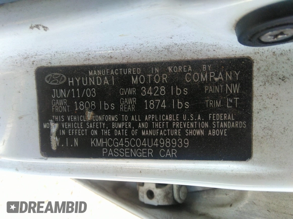 2004 Hyundai Accent GL with VIN KMHCG45C04U498939, listed as a IAAI auction lot 41384821 with 247,994 mi miles. Bid and sale history available at carsss.com. Image 9.