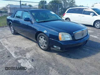 2003 Cadillac DeVille with VIN 1G6KD54YX3U272999, listed as a IAAI auction lot 41704235 with 180,420 mi miles. Bid and sale history available at carsss.com. Image 1.