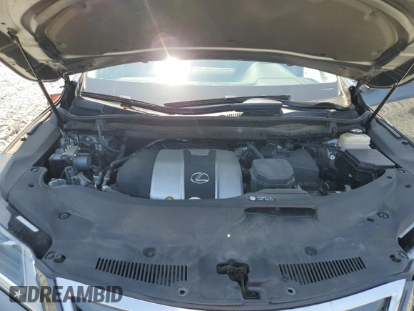 2016 Lexus RX 350 z VIN 2T2BZMCAXGC016678, wystawiony jako Copart lot #61444695 z przebiegiem 63 797 mil mil oraz Szkoda całkowita • Salvage title. Historia ofert i sprzedaży dostępna na DreamBid. Obrazek 11.