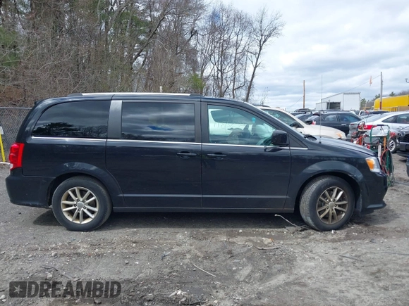 2019 Dodge Grand Caravan SXT with VIN 2C4RDGCG9KR804867, listed as a IAAI auction lot 42032311 with 157,351 mi miles and . Bid and sale history available at DreamBid. Image 13.