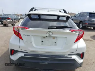2019 Toyota C-HR XLE with VIN JTNKHMBX9K1054053, listed as a IAAI auction lot 42120256 with 67,083 mi miles and . Bid and sale history available at DreamBid. Image 16.
