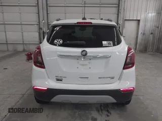 2018 Buick Encore Preferred with VIN KL4CJESB7JB596133, listed as a IAAI auction lot 41085078 with 99,000 mi miles. Bid and sale history available at carsss.com. Image 16.