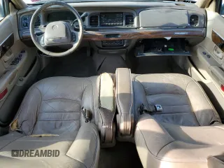 1999 Mercury Grand Marquis LS with VIN 2MEFM75W1XX600671, listed as a Copart auction lot 53323735 with 244,781 mi miles and Salvage Title. Bid and sale history available at DreamBid. Image 8.