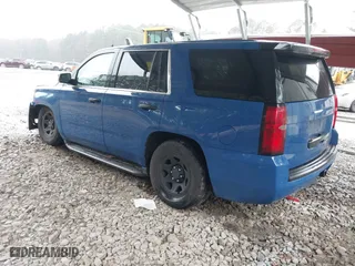 2015 Chevrolet Tahoe Commercial with VIN 1GNSK2EC1FR663199, listed as a IAAI auction lot 41552787 with 148,187 mi miles. Bid and sale history available at carsss.com. Image 3.