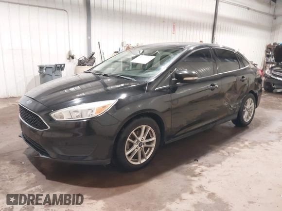 2015 Ford Focus SE with VIN 1FADP3F29FL203084, listed as a IAAI auction lot 42357973 with 99,002 mi miles and . Bid and sale history available at DreamBid. Image 2.