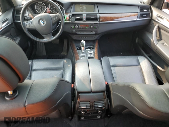 2012 BMW X5 35i z VIN 5UXZV4C56CL749152, wystawiony jako Copart lot #59525155 z przebiegiem 110 773 mil mil oraz Szkoda całkowita • Salvage title. Historia ofert i sprzedaży dostępna na DreamBid. Obrazek 8.