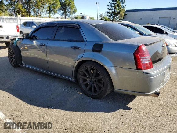 2006 Chrysler 300 C SRT8 with VIN 2C3KA73W06H228944, listed as a Copart auction lot 79866804 with 102,448 mi miles and Salvage Title. Bid and sale history available at carsss.com. Image 2.