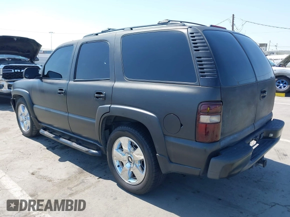 2002 Chevrolet Tahoe LS with VIN 1GNEK13Z82R142862, listed as a IAAI auction lot 42606711 with 189,223 mi miles and . Bid and sale history available at DreamBid. Image 3.