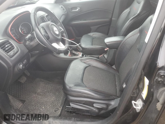 2018 Jeep Compass Trailhawk with VIN 3C4NJDDB6JT207289, listed as a Copart auction lot 56013675 with 83,385 mi miles and Salvage title. Bid and sale history available at DreamBid. Image 7.