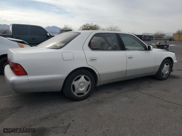 2000 Lexus LS 400 with VIN JT8BH28F9Y0167621, listed as a Copart auction lot 42438605 with 254,587 mi miles and Salvage Title. Bid and sale history available at carsss.com. Image 3.