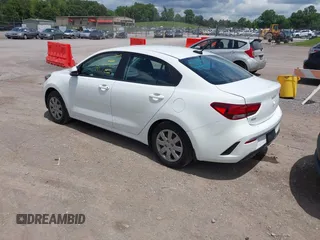 2023 Kia Rio S z VIN 3KPA24ADXPE613557, wystawiony jako IAAI lot #42198794 z przebiegiem 25 275 mil mil oraz . Historia ofert i sprzedaży dostępna na DreamBid. Obrazek 3.