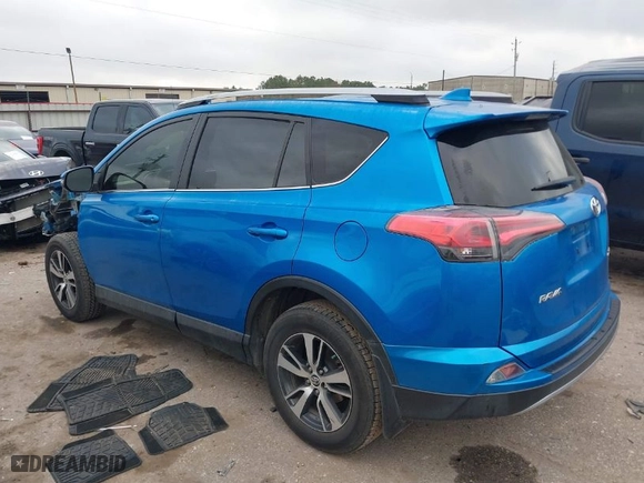 2018 Toyota RAV4 XLE with VIN JTMWFREV0JD128329, listed as a IAAI auction lot 41487410 with 69,237 mi miles. Bid and sale history available at carsss.com. Image 3.