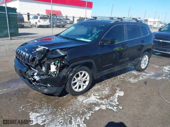 2014 Jeep Cherokee Latitude with VIN 1C4PJLCS3EW287378, listed as a IAAI auction lot 41655723 with 100,927 mi miles. Bid and sale history available at carsss.com. Image 2.