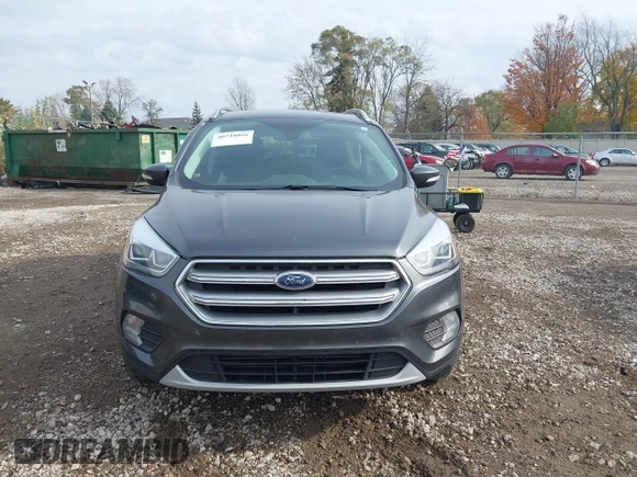 2017 Ford Escape Titanium with VIN 1FMCU9J98HUA49434, listed as a IAAI auction lot 40710866 with 143,850 mi miles. Bid and sale history available at carsss.com. Image 12.