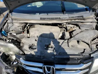 2016 Honda Odyssey Touring Elite with VIN 5FNRL5H91GB092214, listed as a Copart auction lot 61158745 with 121,477 mi miles and Salvage title. Bid and sale history available at DreamBid. Image 12.