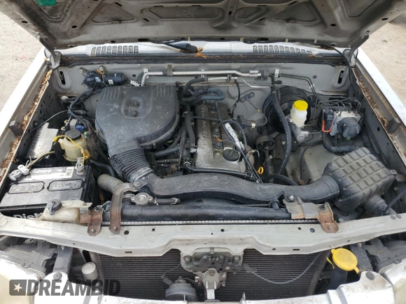 2004 Nissan Frontier XE with VIN 1N6DD26T54C460839, listed as a Copart auction lot 56355795 with 321,540 mi miles and Salvage title. Bid and sale history available at DreamBid. Image 11.