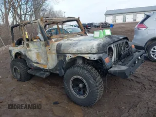 2003 Jeep Wrangler Sport with VIN 1J4FA49S93P374406, listed as a IAAI auction lot 41648982 with Not provided miles and . Bid and sale history available at DreamBid. Image 1.