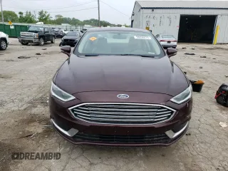 2018 Ford Fusion SE z VIN 3FA6P0HD2JR185298, wystawiony jako Copart lot #58898075 z przebiegiem Nie podano mil oraz Czysty tytuł • Clean title. Historia ofert i sprzedaży dostępna na DreamBid. Obrazek 5.