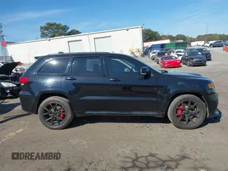 2017 Jeep Grand Cherokee SRT with VIN 1C4RJFDJ2HC696025, listed as a IAAI auction lot 41863274 with 126,949 mi miles. Bid and sale history available at carsss.com. Image 13.