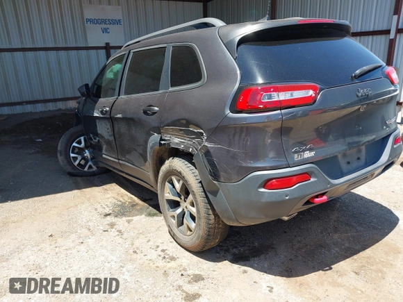 2016 Jeep Cherokee Trailhawk z VIN 1C4PJMBSXGW123829, wystawiony jako IAAI lot #42316140 z przebiegiem 77 730 mil mil oraz . Historia ofert i sprzedaży dostępna na DreamBid. Obrazek 3.